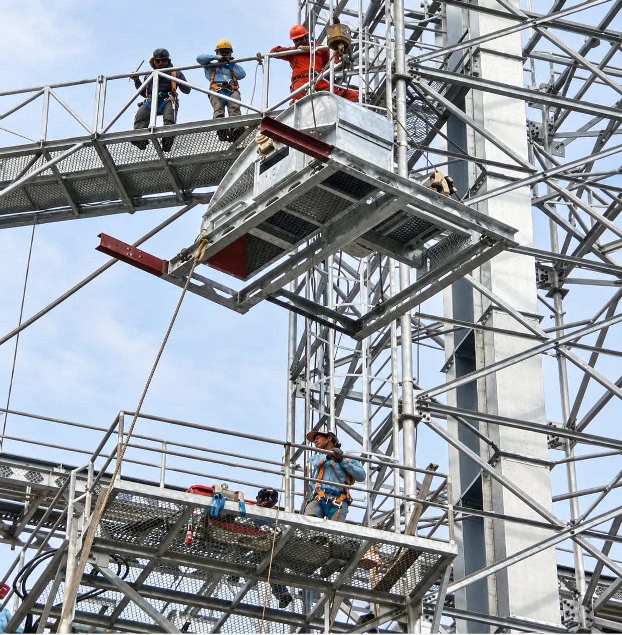 MWT crew installing a bucket elevator, conveyor and supporting steel structure on an industrial site in Central Java